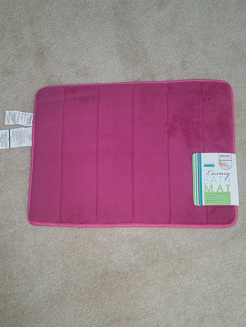 Medium pink New luxury bath mat 17 X 24"new w tags